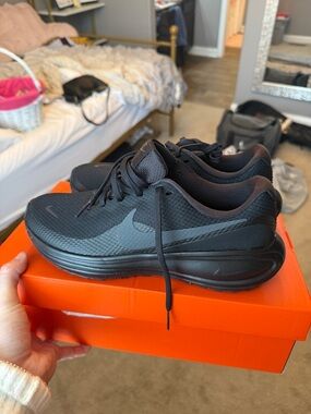 Nike women’s All-Black Lightweight Mesh Running Sneakers